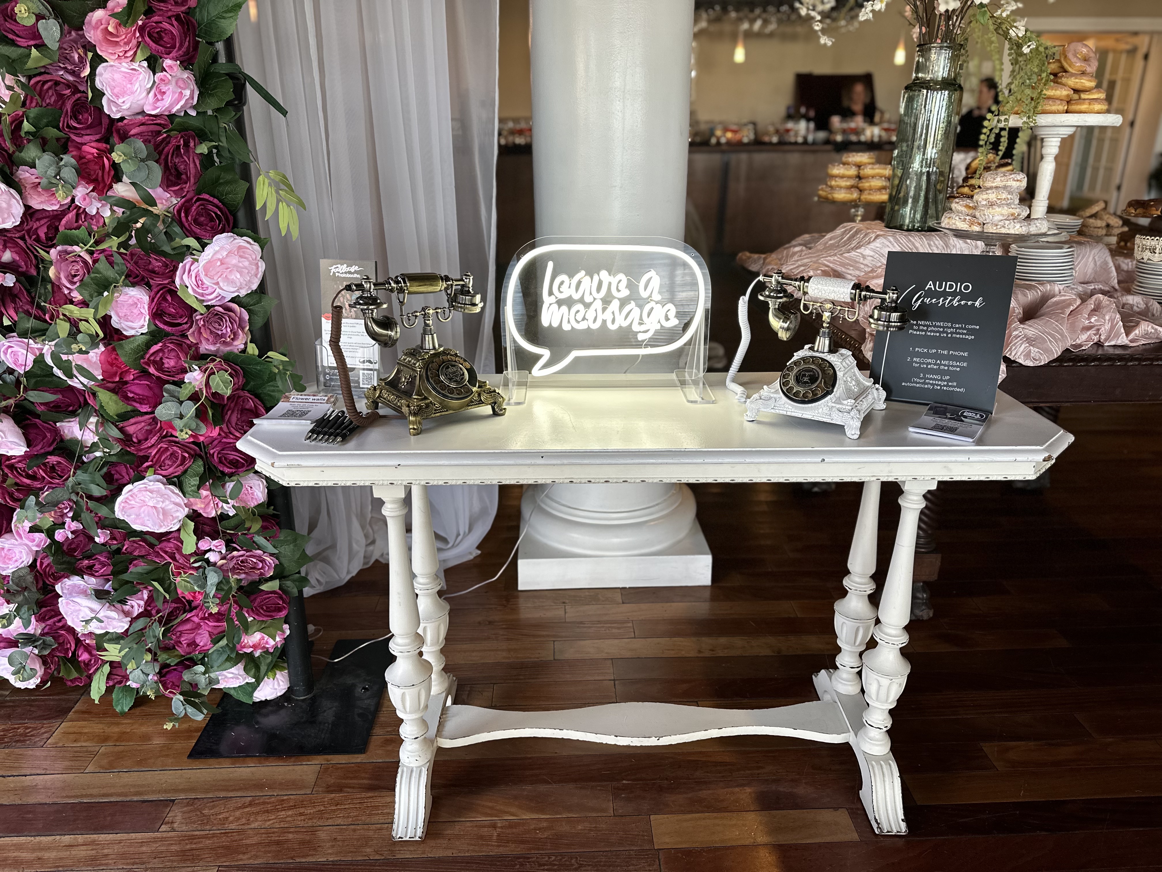 Audio guestbook vintage phone decorated at wedding table
