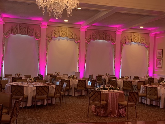 Backyard party with uplighting and festive atmosphere in Jacksonville FL