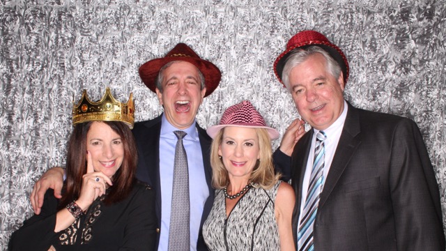 Guests having fun in photobooth at Jacksonville birthday party