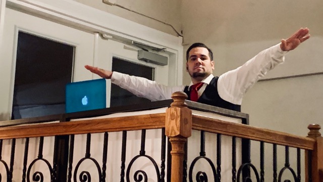 DJ at high school prom keeping dance floor packed