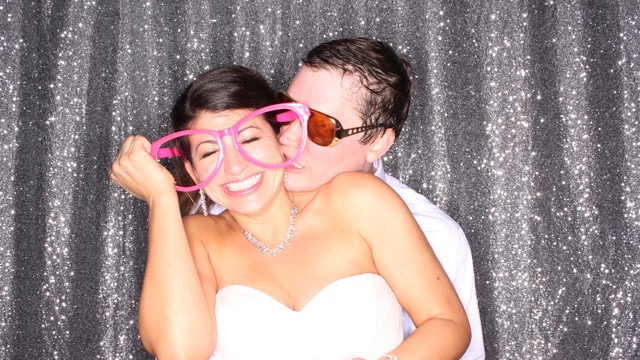 Elegant wedding photobooth with guests celebrating in Jacksonville