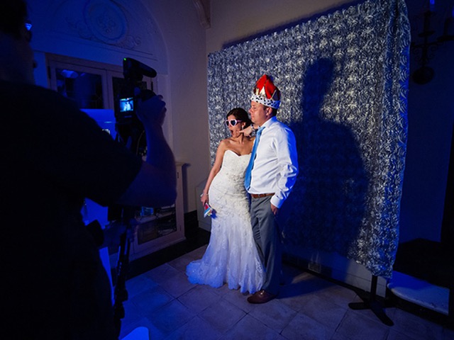 Wedding photobooth with custom backdrop and props at Jacksonville and St. Augustine wedding